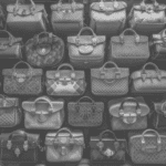 Here is our featured image, depicting rows of designer bags in black and white to illustrate superfake luxuries on the market.
