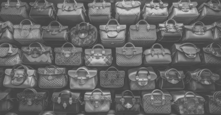 Here is our featured image, depicting rows of designer bags in black and white to illustrate superfake luxuries on the market.