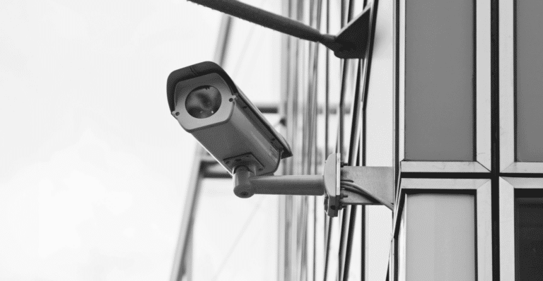 In this image, we use a black and white image of a camera to depict the actions that banks, fund companies, and the investment industry can take to boost and protect themselves while taking action against digital threats.
