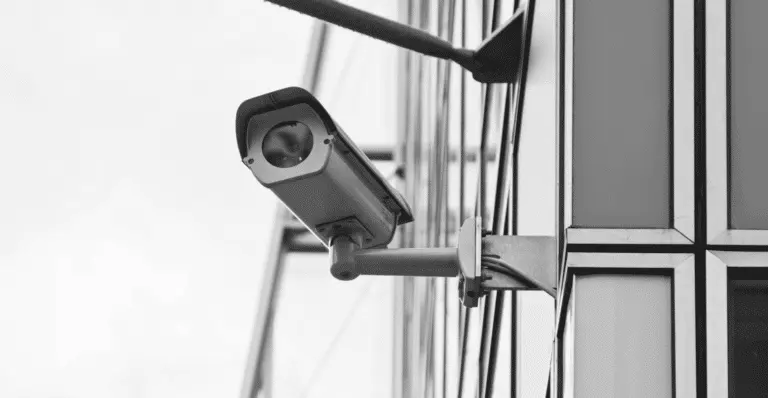 In this image, we use a black and white image of a camera to depict the actions that banks, fund companies, and the investment industry can take to boost and protect themselves while taking action against digital threats.