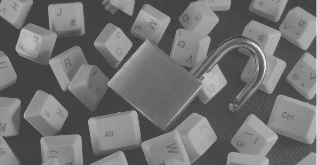 Here we have an image of an unlocked padlock amid a series of loose keyboard keys, illustrating the digital security aspects of our discussion concerning the ways in which a DNS lookup interacts with anti-phishing threat intelligence.