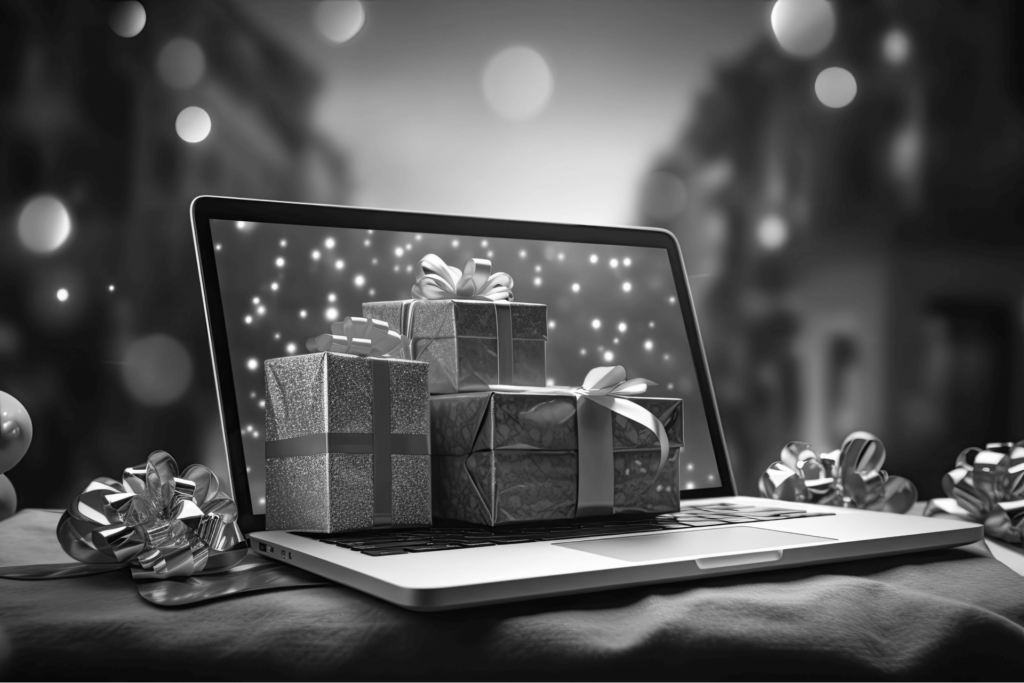 This image of a computer with gifts emerging highlights the Christmassy, festive ecommerce angle of our counterfeits discussion.