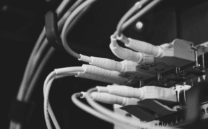 This images of wires in a server represents the topic of Part 4 of the definitive cybersecurity checklist: DNS servers.
