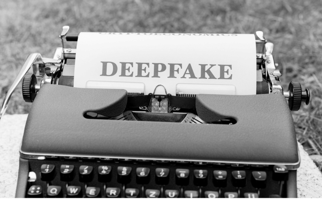 This image of a typewriter printing the word " deepfakes " highlights the topic at hand.