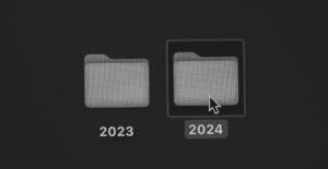 This image of two folders marked "2023" and "2024" highlights this post's topic: a press release about EBRAND's achievements in 2023.