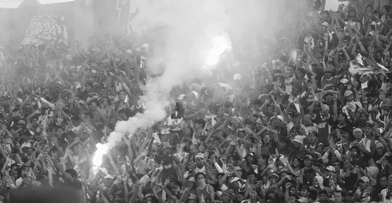 This image of football ultras at a stadium highlights the topic of this blog: online protection in football and beyond.