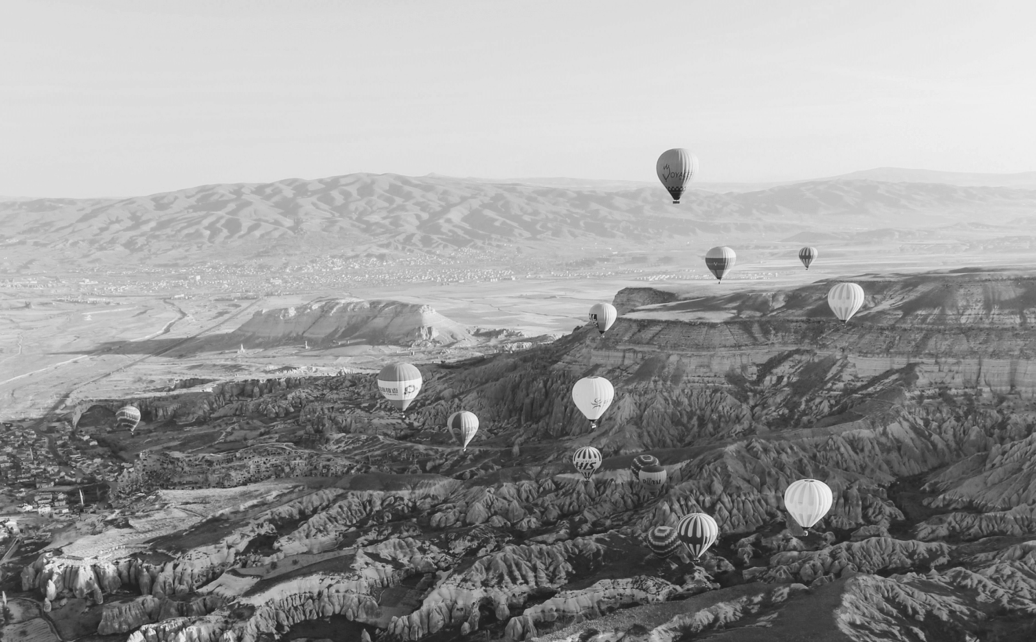 This image of launched hot air balloons highlights this post's topic: New TLDs.