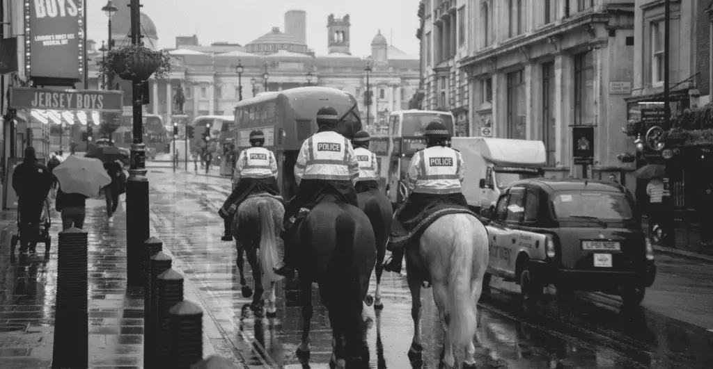 This image of police in London highlights our discussion topic: Cyberattacks during the election, and what brands can learn from them.