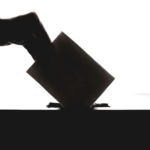 This silhouette of a hand putting a vote into a ballet box highlights our discussion topic: Cyberattacks during the election, and what brands can learn from them.