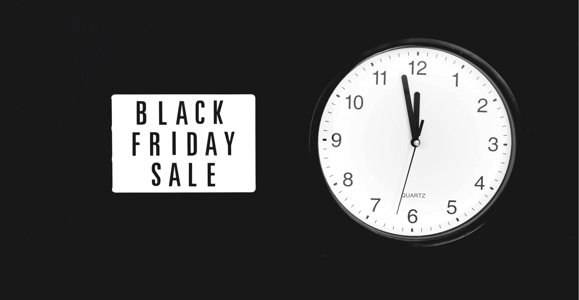 This image of a clock with the text "Black Friday Sale" illustrates our discussion topic: The scams targeting brands around Black Friday Sales, and how to stop them.