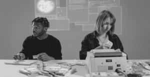 This image of two people counting money in front of a digital background highlights this post's discussion topics: CDN fake shops, and how to fight back.