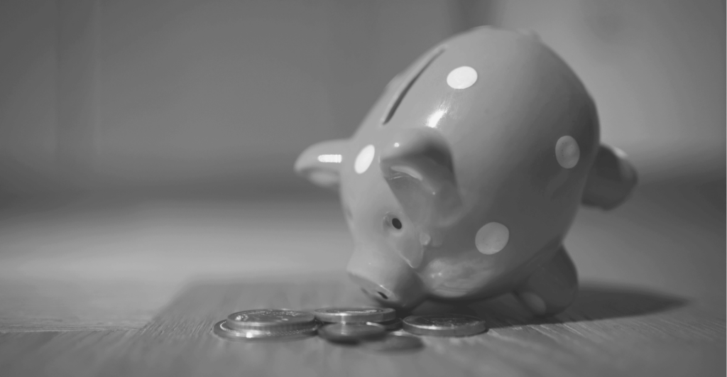 This image of a piggy bank highlights the discussion topic of online banking, and how organizations should chase banking cyberattacker away from their online landscapes with digital risk protection.