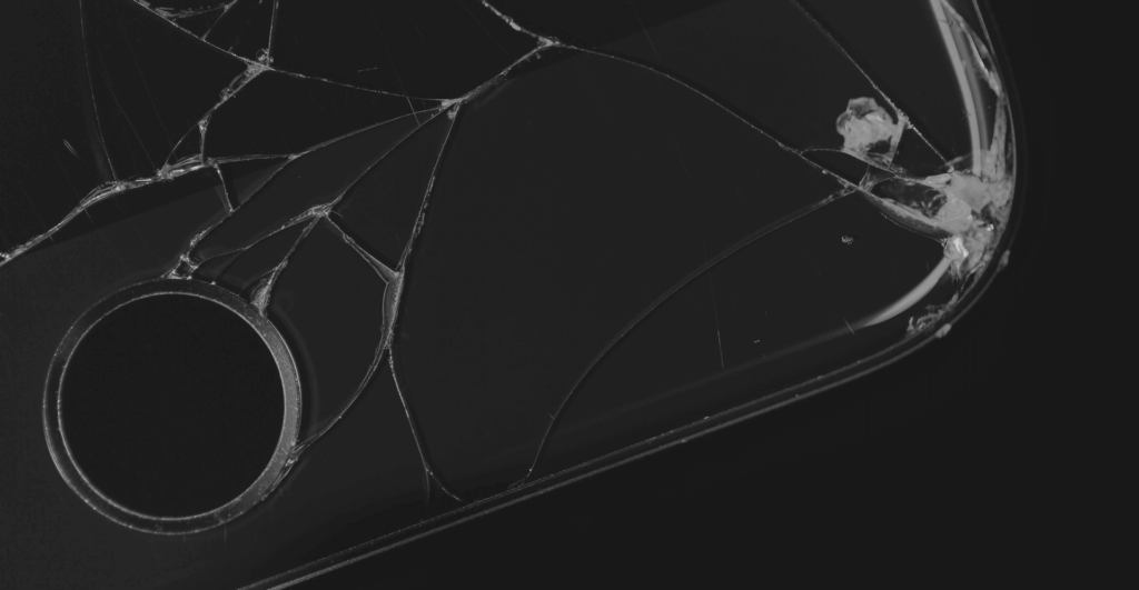 This image of a smashed phone highlights the discussion topic of online banking, and how organizations should chase banking cyberattacker away from their online landscapes with digital risk protection.