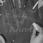 This image of a schools stationary and the words "back to school" illustrates our discussion topic: Back to school scams.