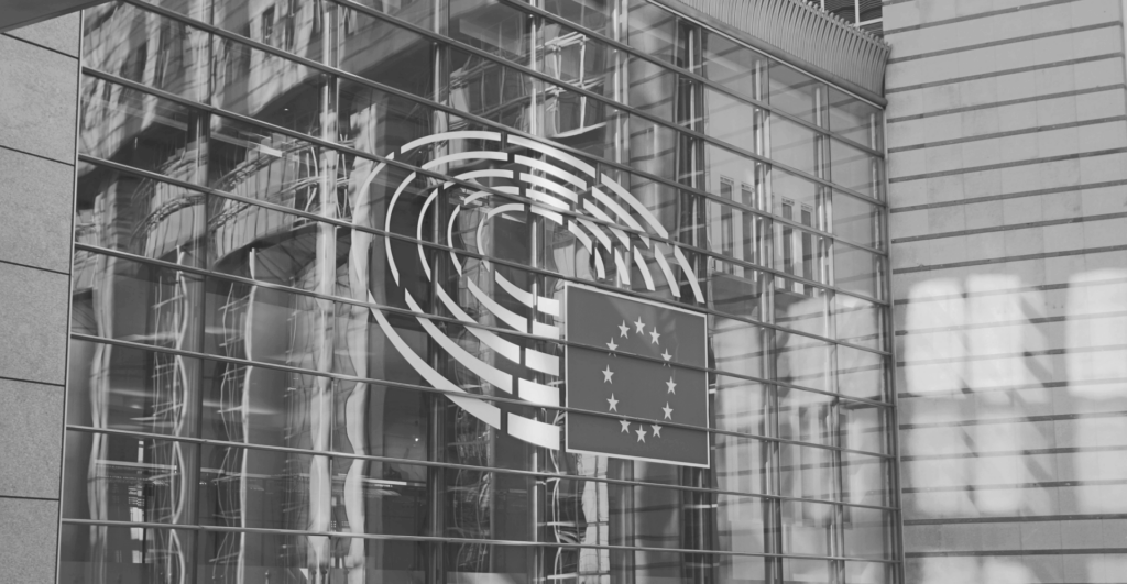 This image of a European Parliament building illustrates our discussion topic: NIS2, the changes for your organization, and the relevance of Corporate Domain Management.