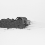 This image of a protein powder scoop illustrates our discussion topic: Fitness counterfeits and online scams from jerseys to protein powder, and how brands can fight back/
