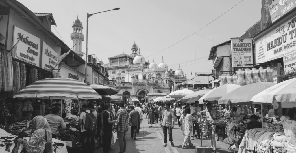 This image of Mumbai train station viewed from a nearby market illustrates our discussion topic: Takeaways from ICANN 85 in Mumbai, ahead of the next round of new gTLDs.