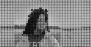 This image of a pixellated face illustrates our discussion topic about fake identity websites.