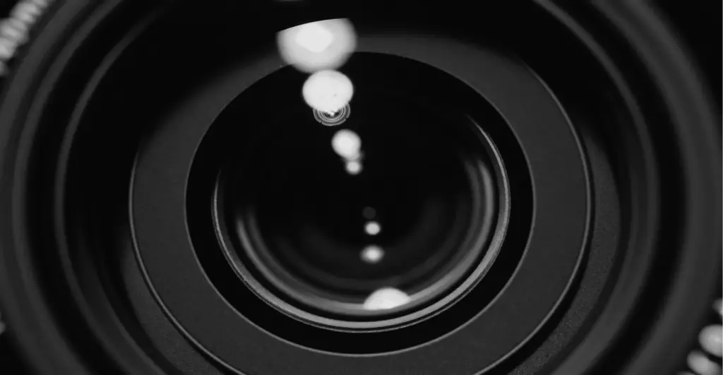 This image of a camera lens illustrates our discussion topic on livestream counterfeiting and how brands can stay safe.
