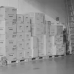 This image of a stack of parcels in a warehouse illustrates our discussion topic about dropshipping scams.