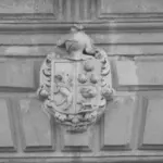 This image of a shield with a coat of arms in Spain illustrates our discussion topic: IP Protection and our legal advisor's lessons from Spain.