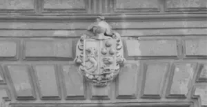 This image of a shield with a coat of arms in Spain illustrates our discussion topic: IP Protection and our legal advisor's lessons from Spain.
